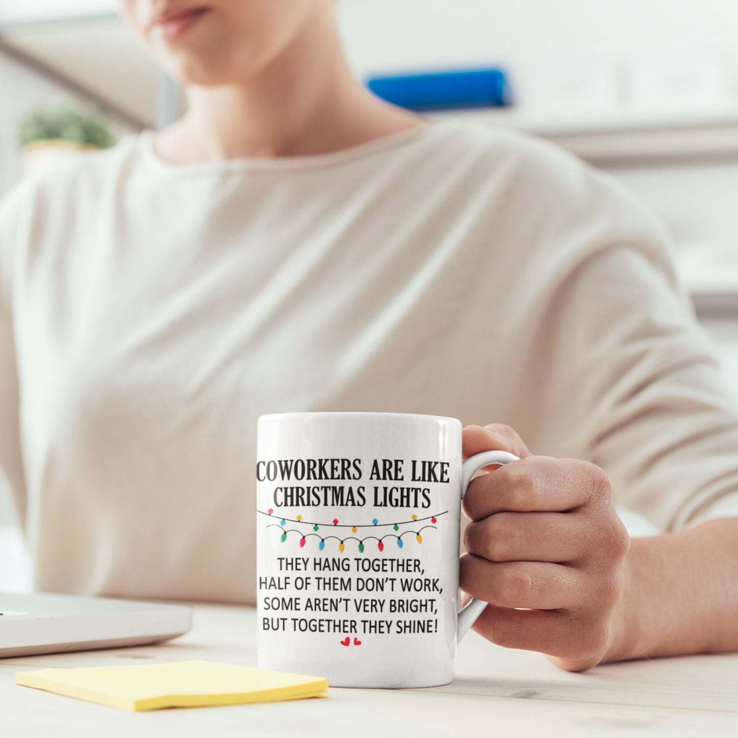 Funny Office Coffee Mug 11oz being enjoyed by a person at a desk, emphasising its role as a cheerful addition to any office setup.