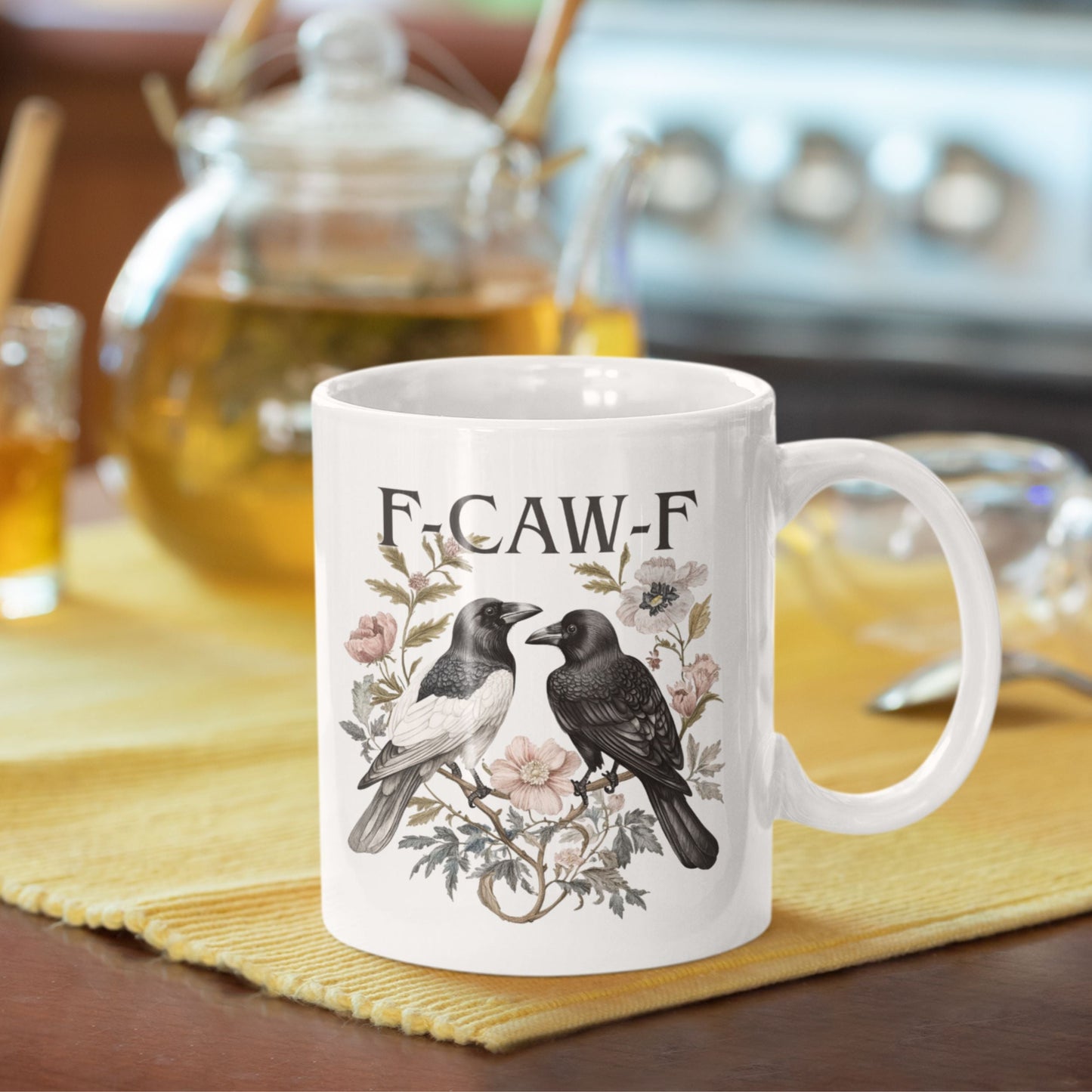 Funny Swear Words F Caw Halloween Mug set against a minimalistic background. A trendy gothic coffee cup that combines humour with artistic design.