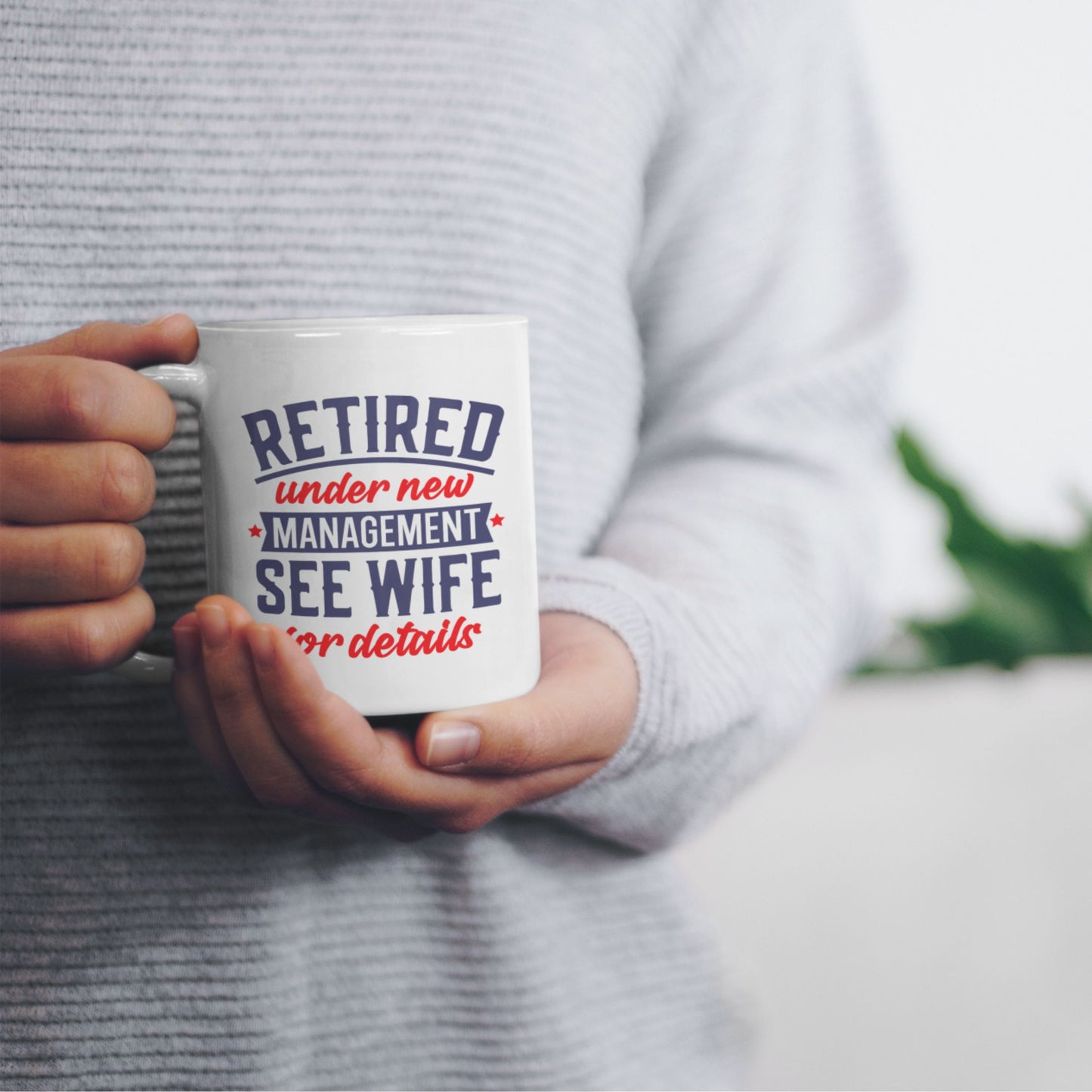 A person holding the Happy Retirement Coffee Mug 2025 with a joyful message, making it a fun gift for retiring colleagues.