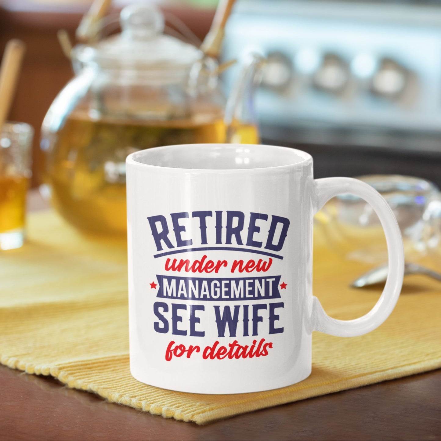 Happy Retirement Coffee Mug 2025 placed on a kitchen table, ideal for gifts for retiring colleagues to celebrate their new journey.