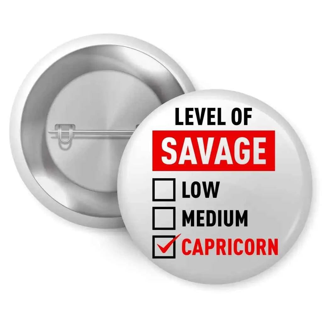 Capricorn zodiac pin featuring a humorous design that highlights the level of savage as 'CAPRICORN' with checkbox options for low and medium. Perfect accessory for astrology enthusiasts.
