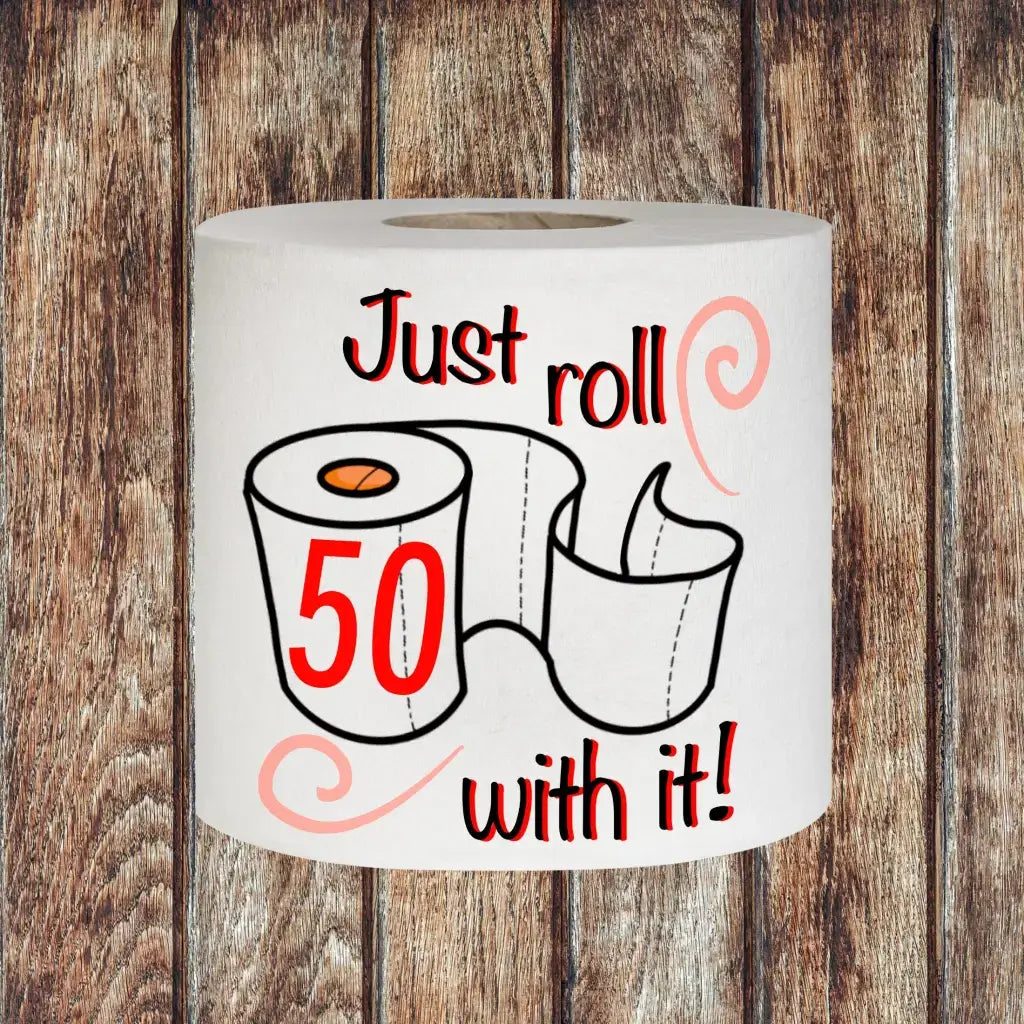 Funny Toilet Roll Gift: Close-up of the Novelty 50th Birthday Toilet Tissue with 'Just roll 50 with it!' printed, a humorous keepsake for celebrating a milestone birthday.