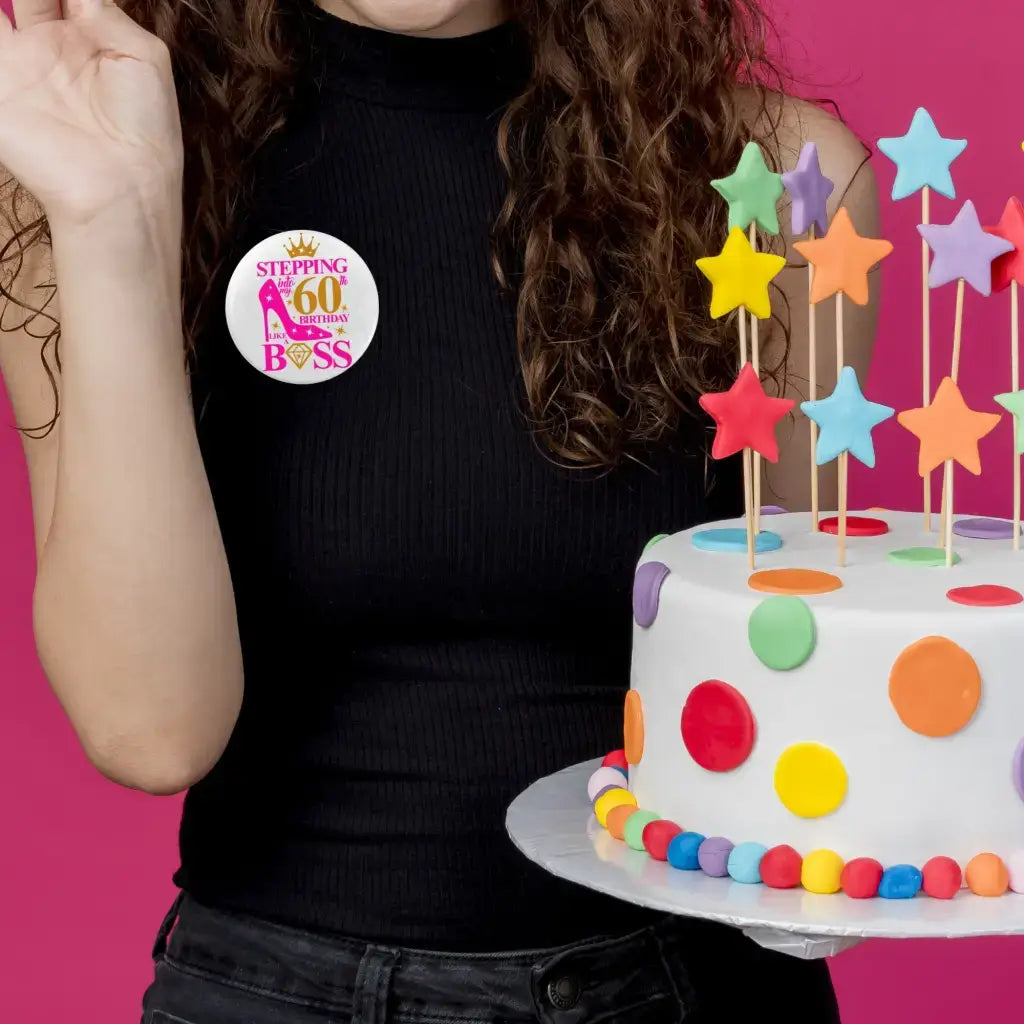 Woman wearing a 60th birthday badge, adding a touch of elegance to her outfit during milestone celebrations.