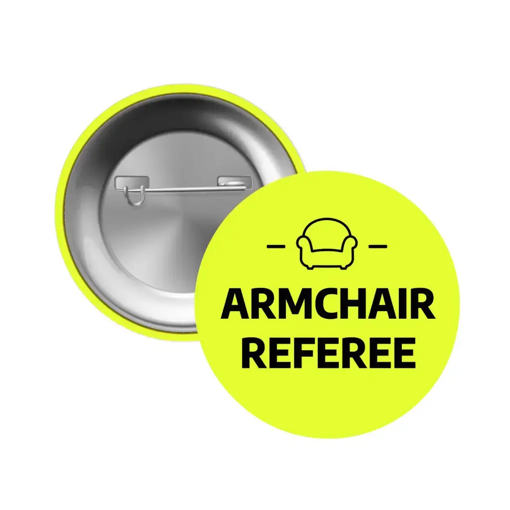 Back view of a Funny Football Badge with 'Armchair Referee' text, highlighting its pin mechanism.