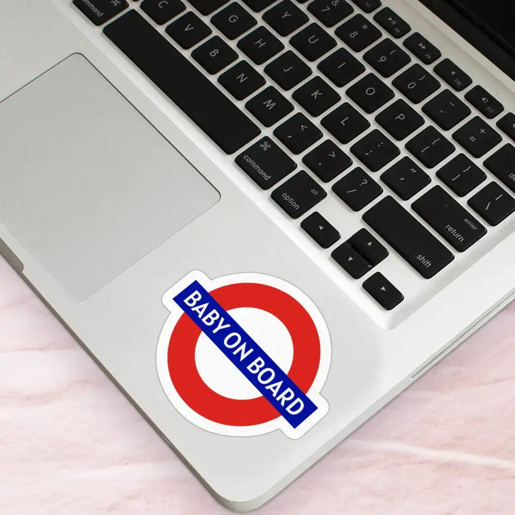 Laptop adorned with Pregnancy Announcement Stickers - Baby On Board London Design, showcasing a vibrant and stylish way to share exciting news.