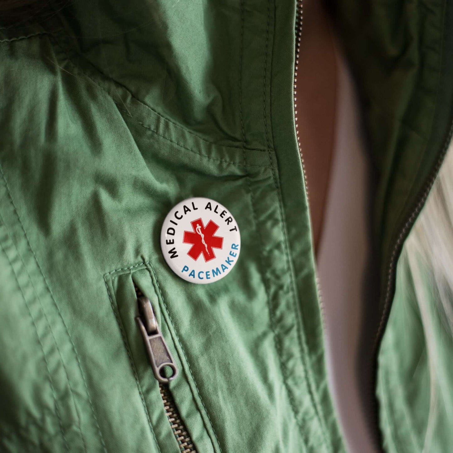 Pacemaker Alert Pin showcased on a jacket, emphasising style and essential health communication.