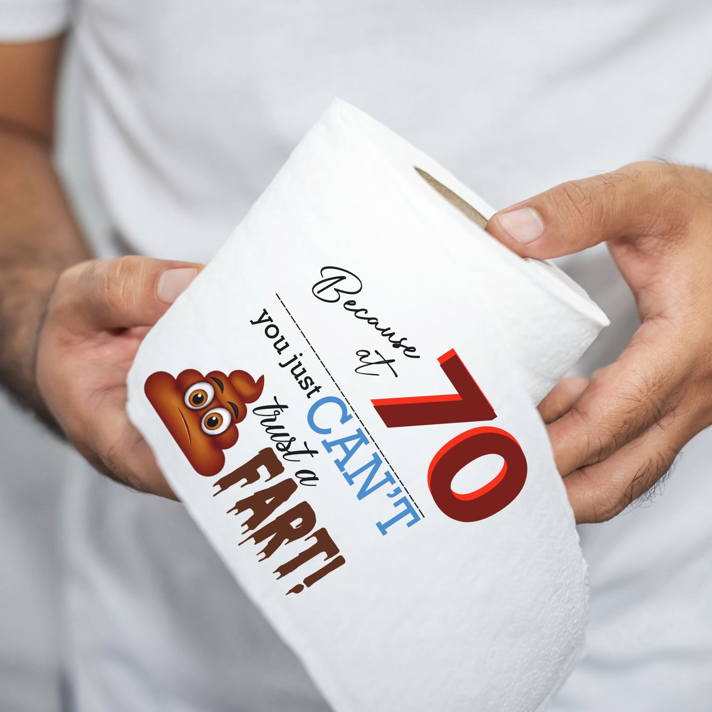 Person holding a mug with humorous text and emoji design.