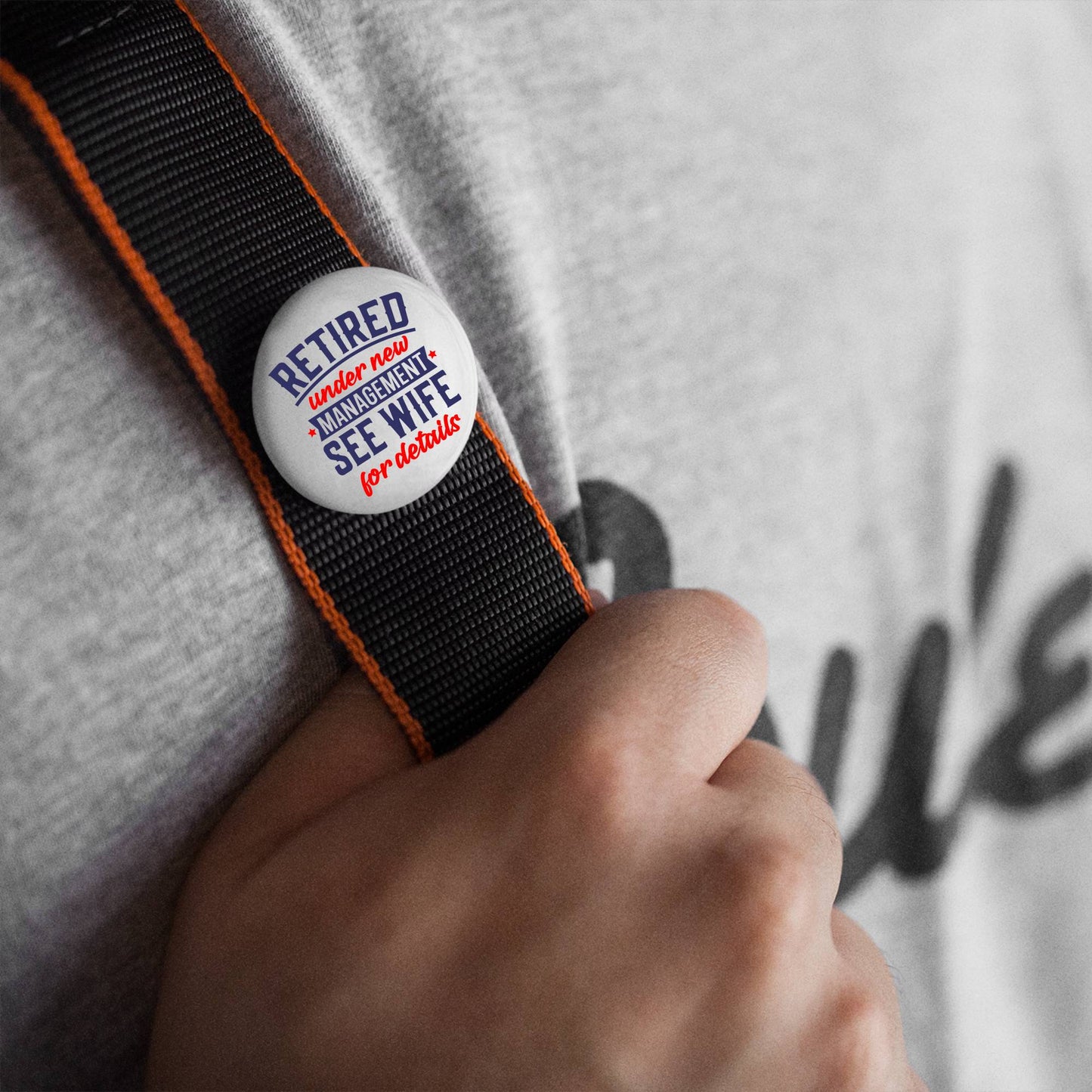 Retirement Badges: Heartfelt Thank You Gifts for Men - A badge worn on a strap with 'Retired under new management, see wife for details' - Unique farewell gift ideas for colleagues.