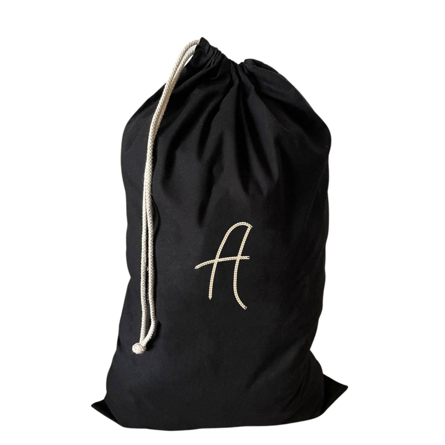 Personalised large drawstring laundry bag with an embroidered A, made from eco-friendly recycled cotton.