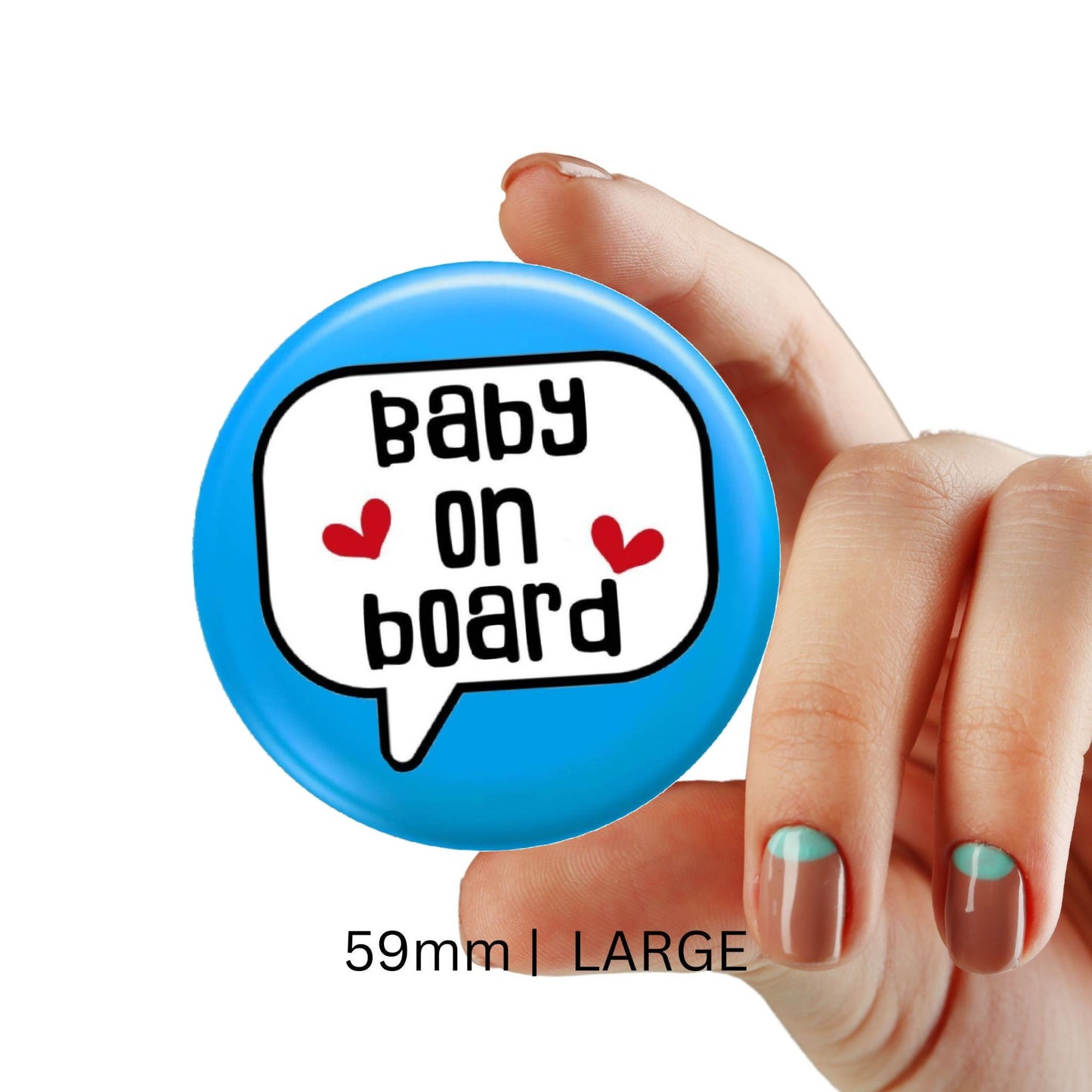 Individual presenting a large blue baby on board badge, size 59mm, designed to communicate pregnancy awareness effectively.