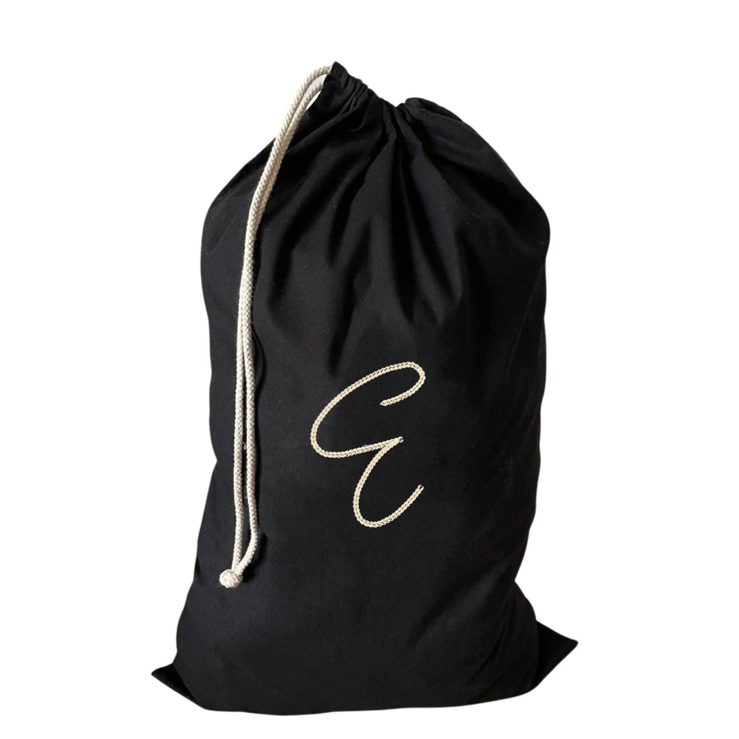 Unique large drawstring laundry bag featuring an E monogram, perfect for laundry day.