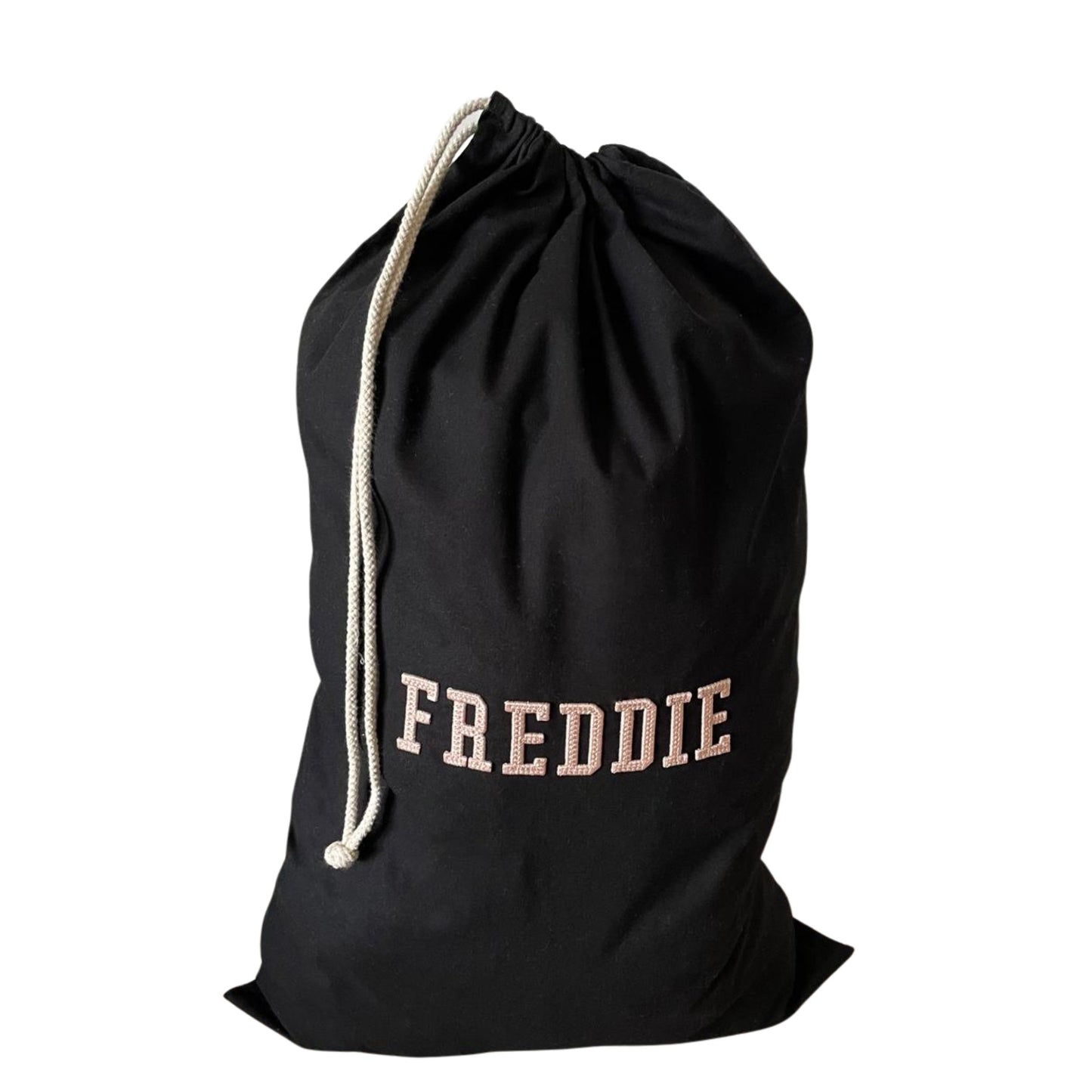 Black drawstring bag with 'FREDDIE' printed on it against a white background