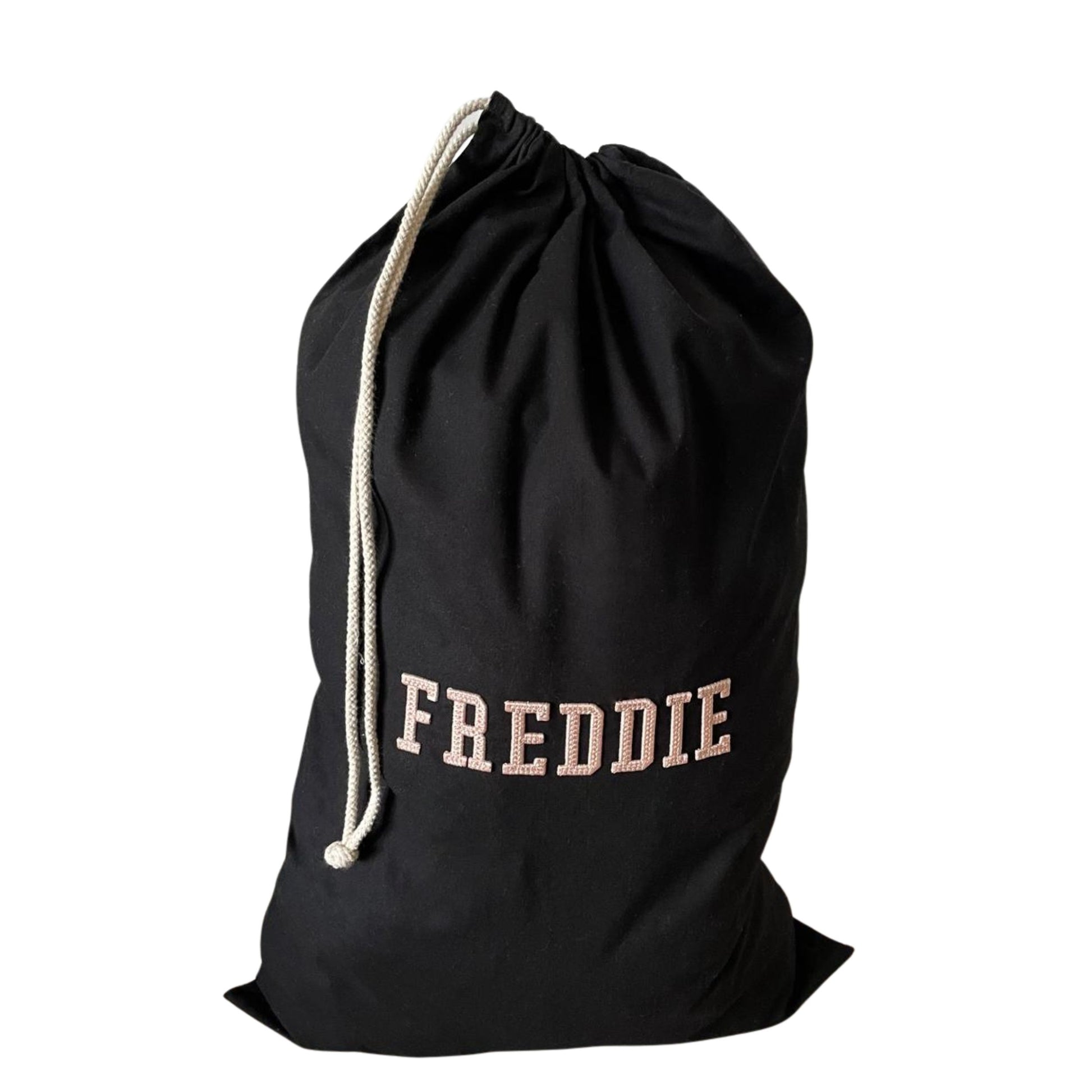 Black drawstring bag with 'FREDDIE' printed on it against a white background