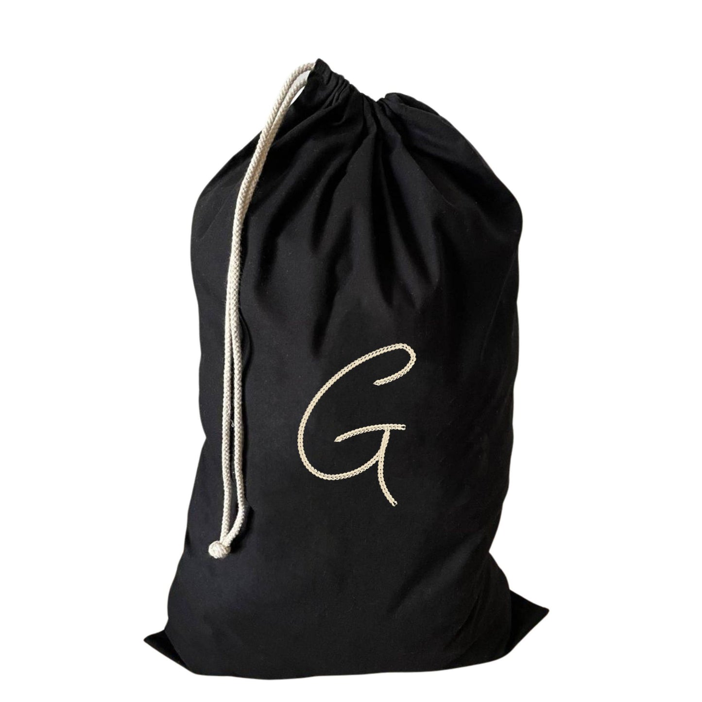 Chic large drawstring laundry bag showcasing a G initial, ideal for stylish laundry organisation.