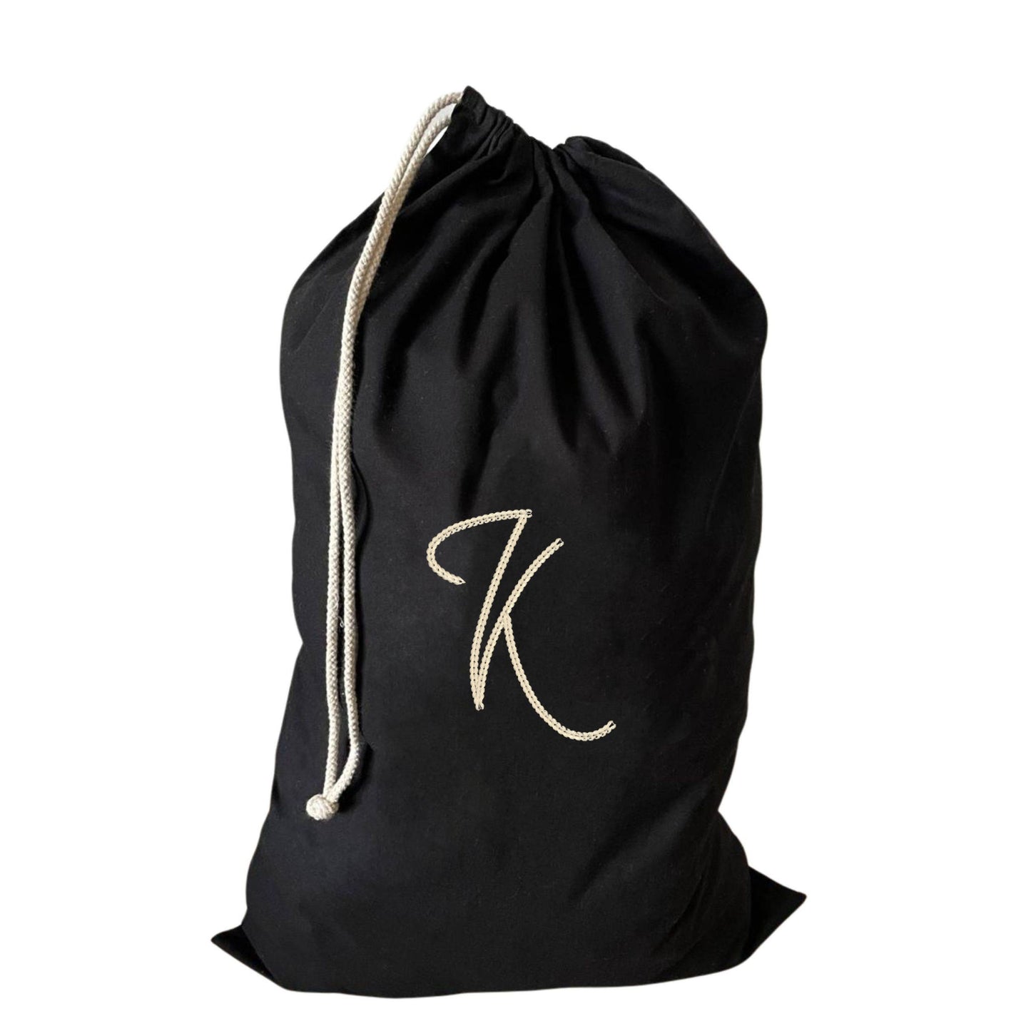 Attractive large drawstring laundry bag embroidered with K, perfect for tackling laundry chaos.