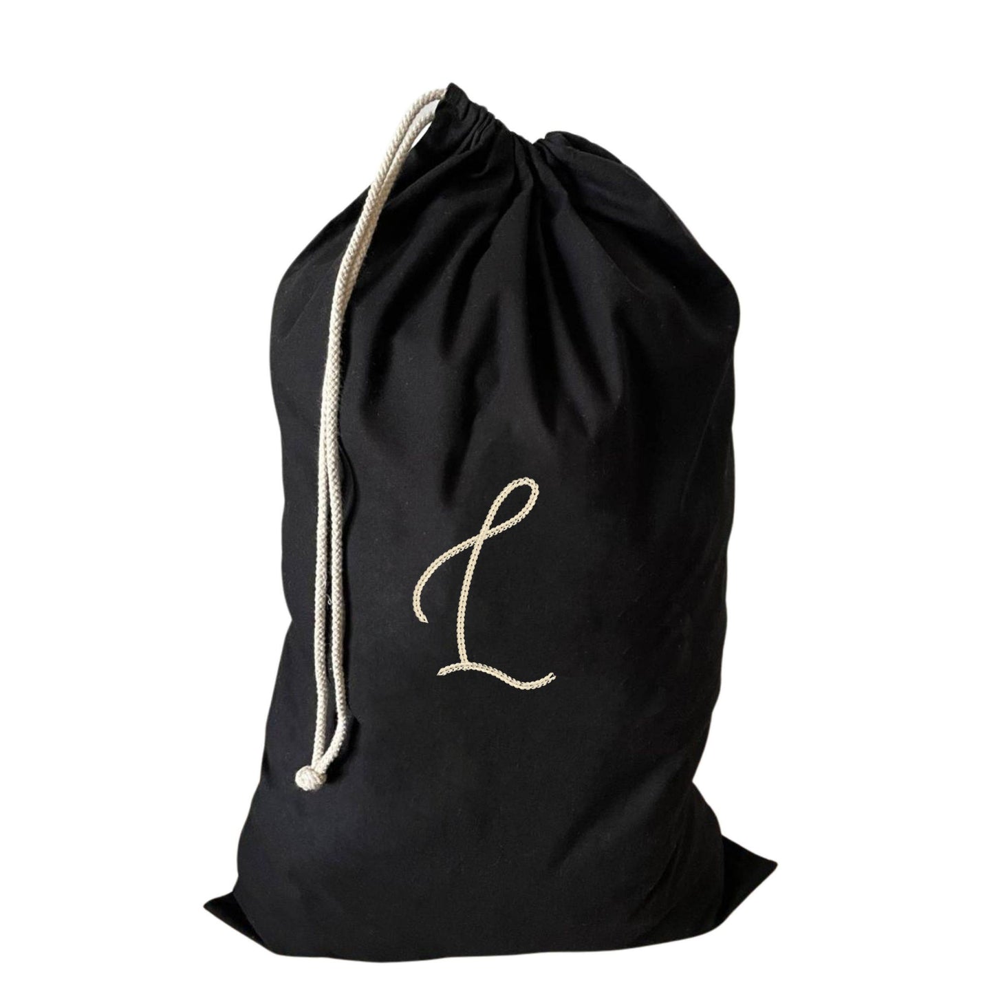 Beautiful large drawstring laundry bag featuring an L initial, crafted from recycled cotton.