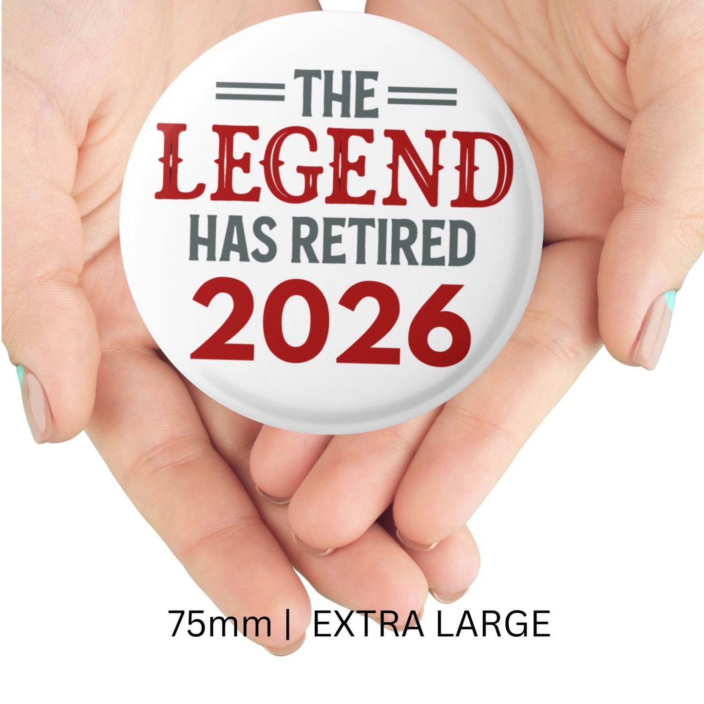 Button badge with 'The Legend Has Retired 2026' text held between two hands.