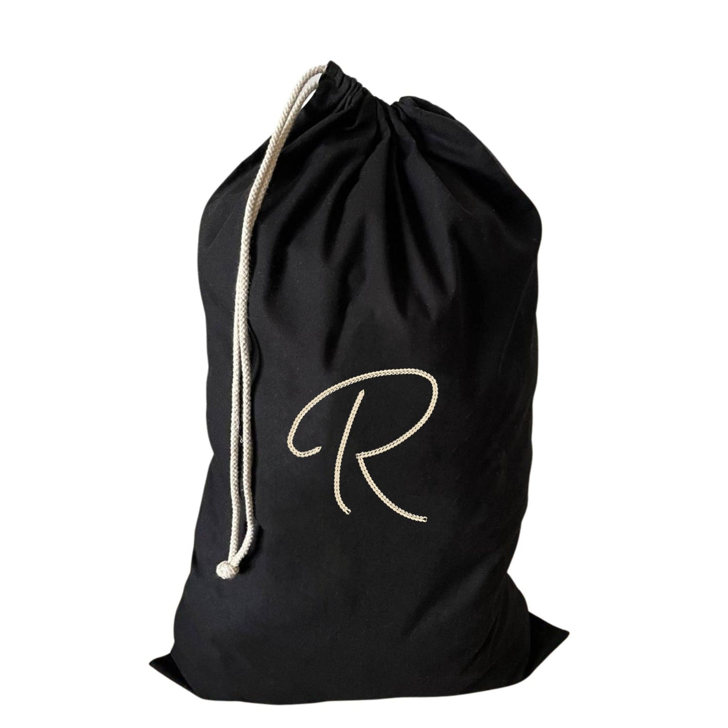 Custom large drawstring laundry bag featuring an R initial, perfect for laundry organisation.