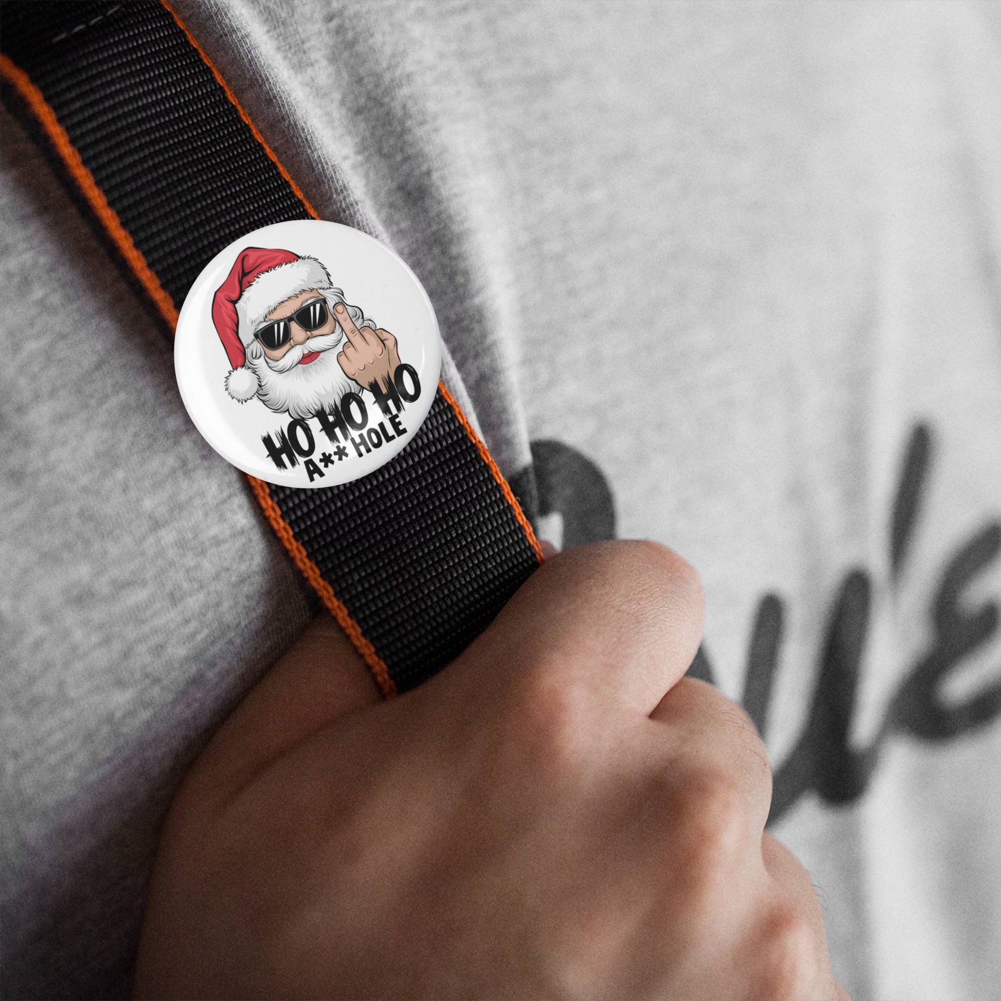 Rude Christmas Badges collection, featuring funny Santa illustrations, ideal for cheeky Santa gifts and festive fun.