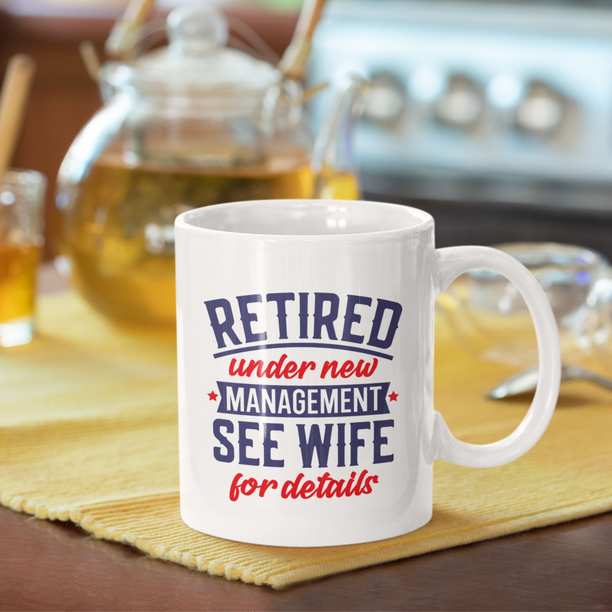 Happy Retirement Coffee Mug 2025 placed on a kitchen table, ideal for gifts for retiring colleagues to celebrate their new journey.