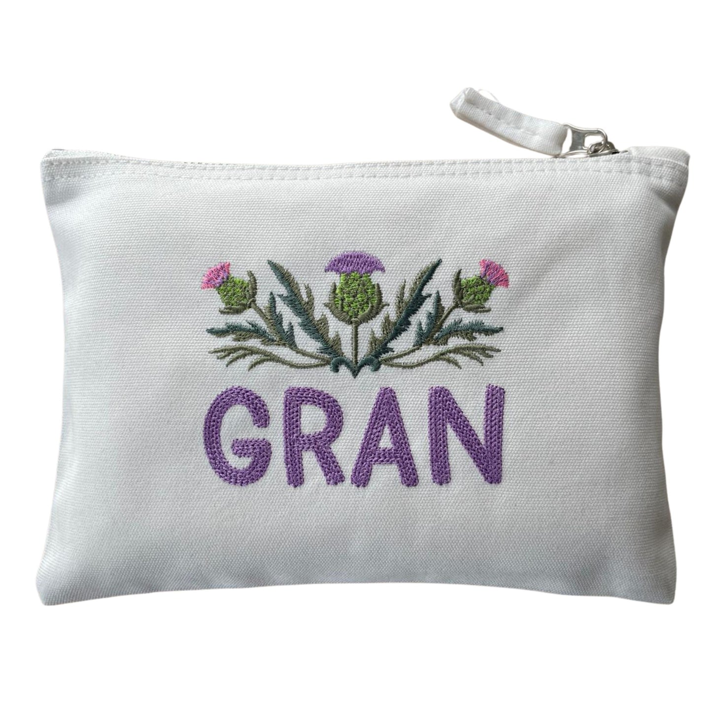 White Custom Scottish Thistle Gift Zipper Pouch with 'GRAN' embroidery. A special Scottish thistle gift for grandmothers.