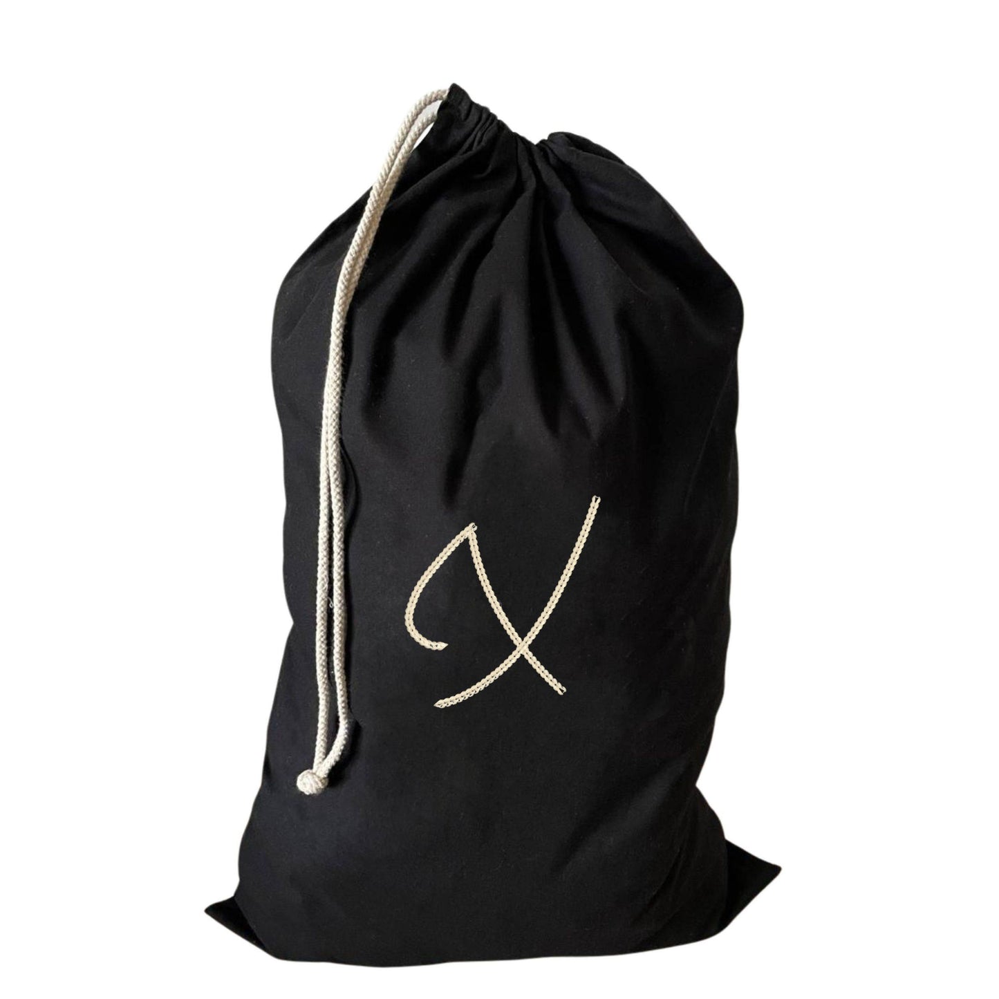 Elegant large drawstring laundry bag featuring an X initial, crafted from sustainable recycled materials.