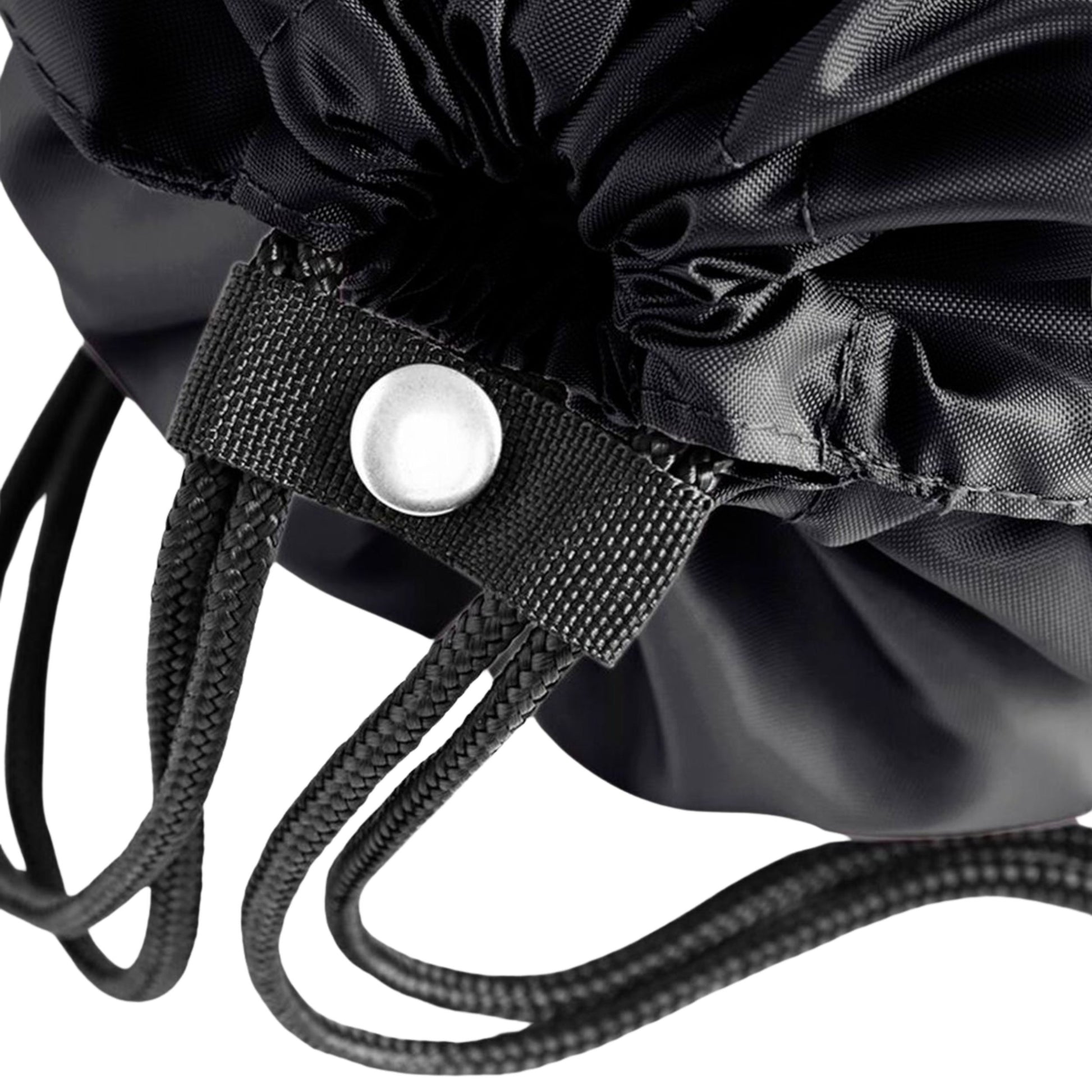 Close-up of a black drawstring bag with a button on a white background