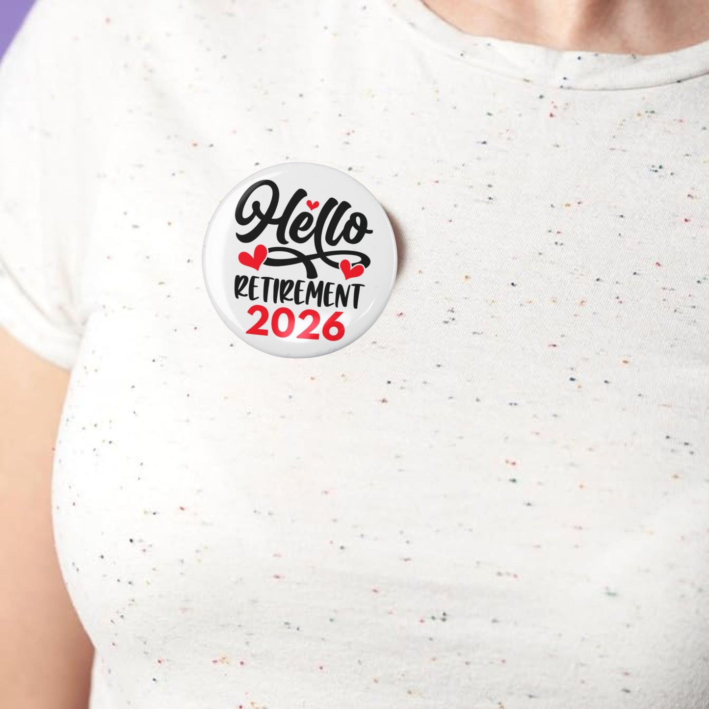 Hello Retirement 2026 Badge – Funny Retirement Gift Pin Button worn on a shirt during a celebration.