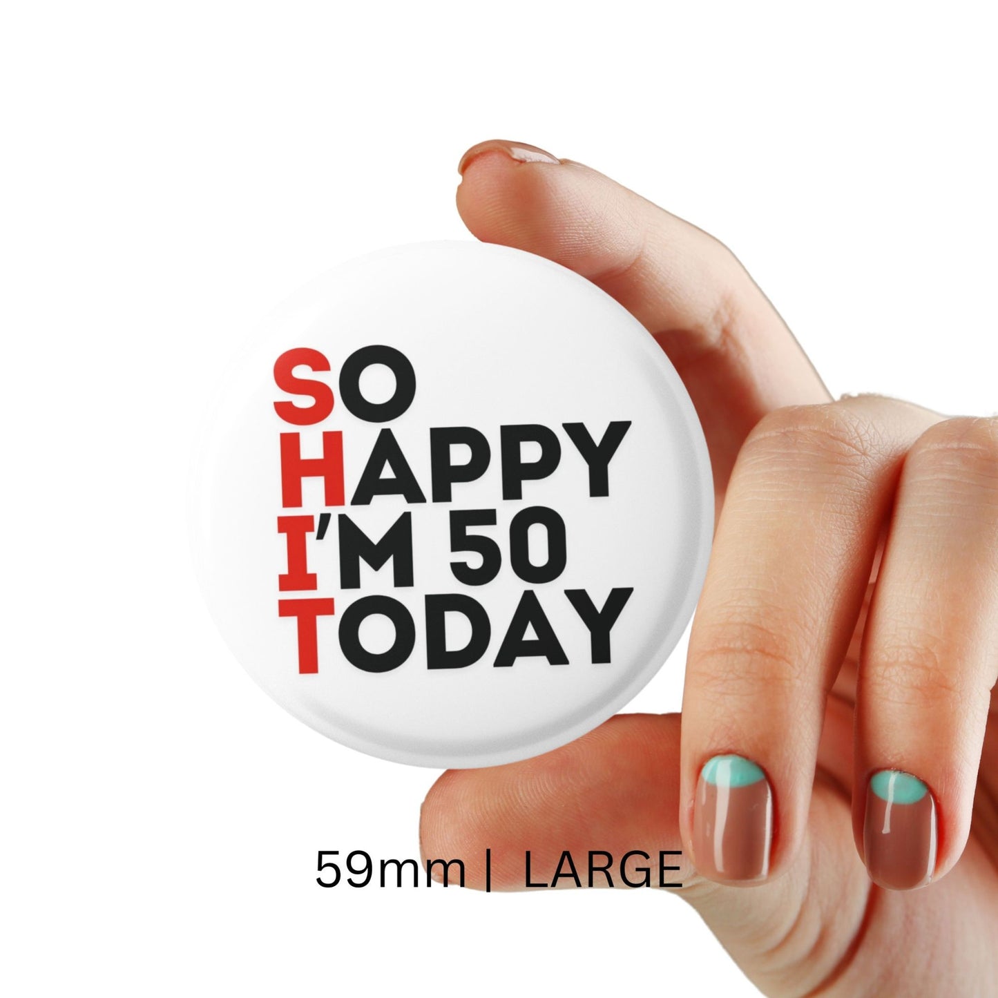 A hand showing a large 50th birthday badge with a cheeky message 'SO HAPPY I'M 50 TODAY'.