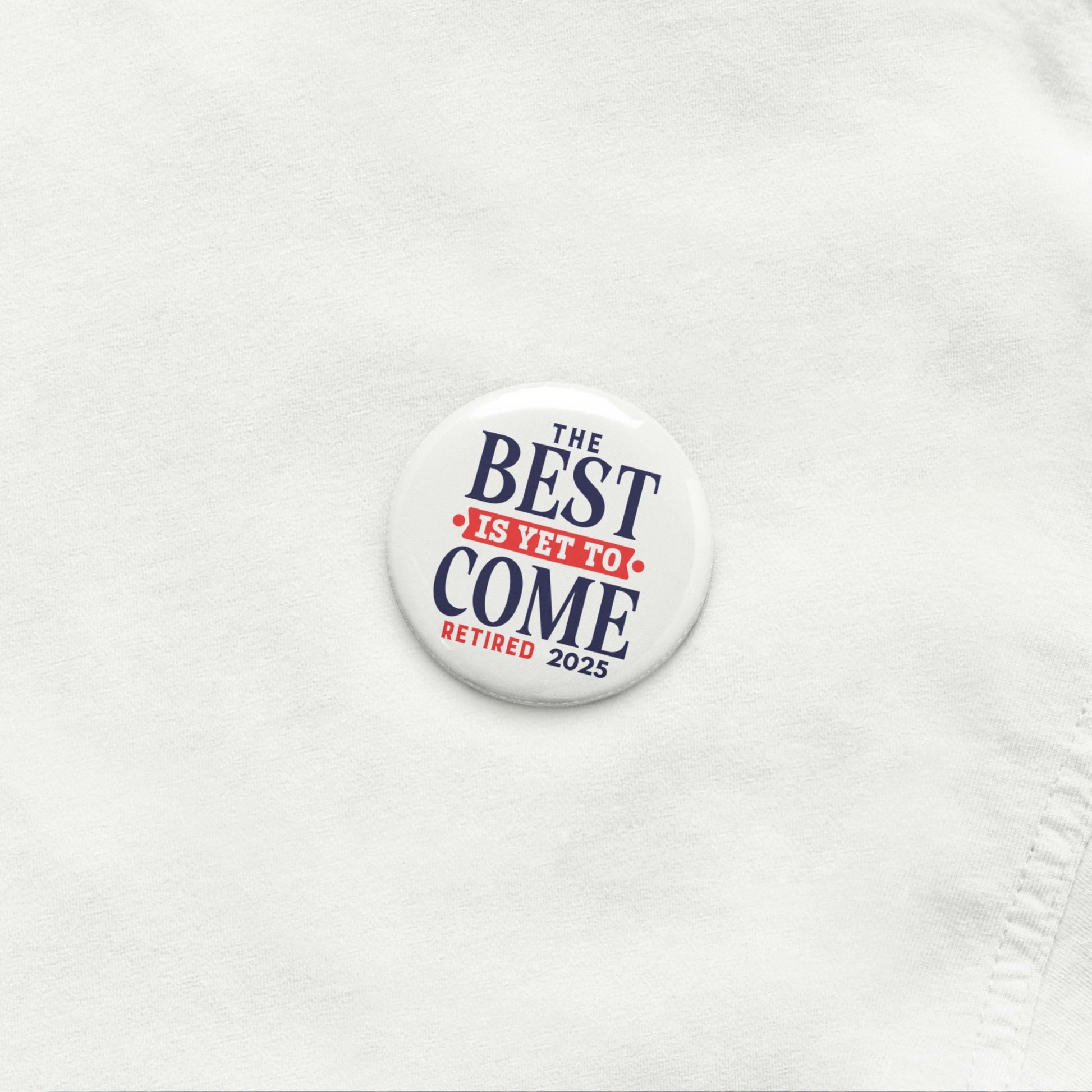 Close-up of the Happy Retirement Party Pin on white fabric, highlighting the 'Retired 2025' message. A memorable retirement party pin.