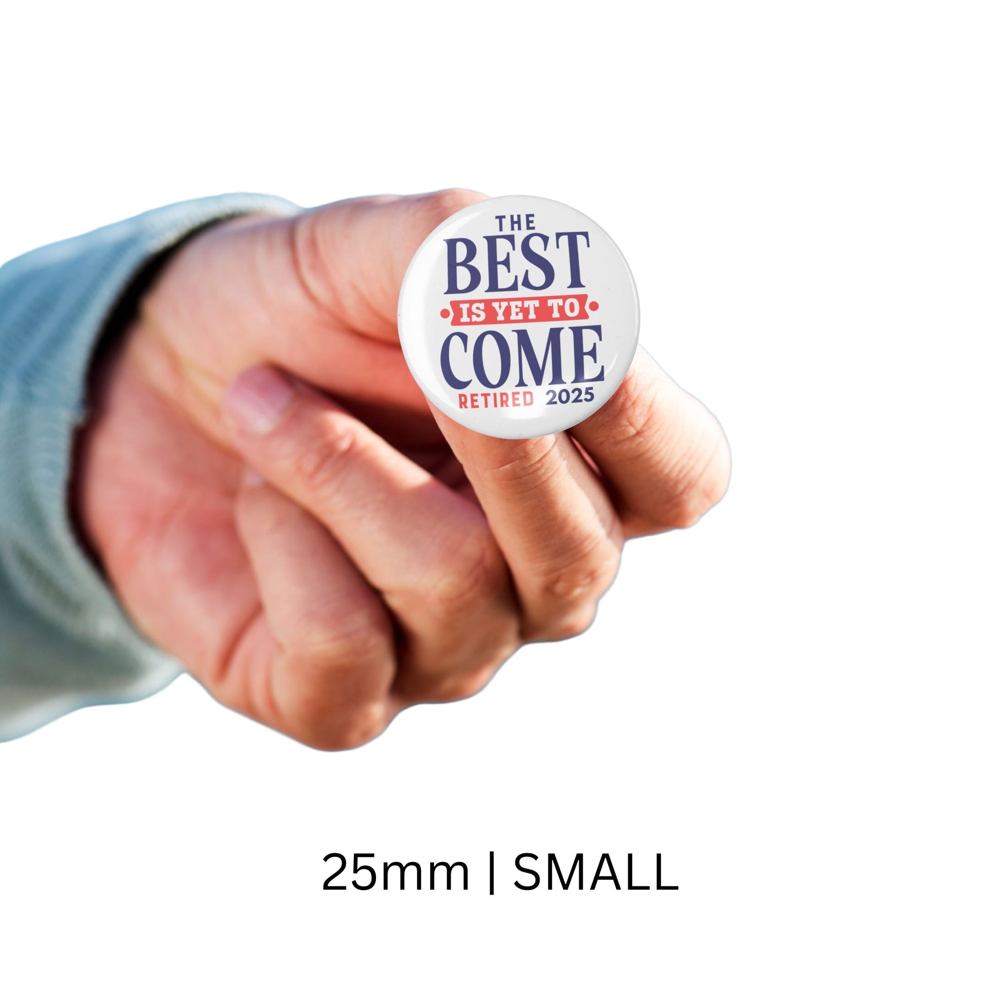 Person holding the small version of the Happy Retirement Party Pin (25mm). Perfect gift option for those celebrating retirement.